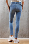 High Rise Destructed Skinny Jeans